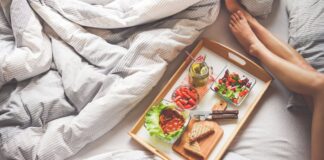 Healthy food laying on a bed